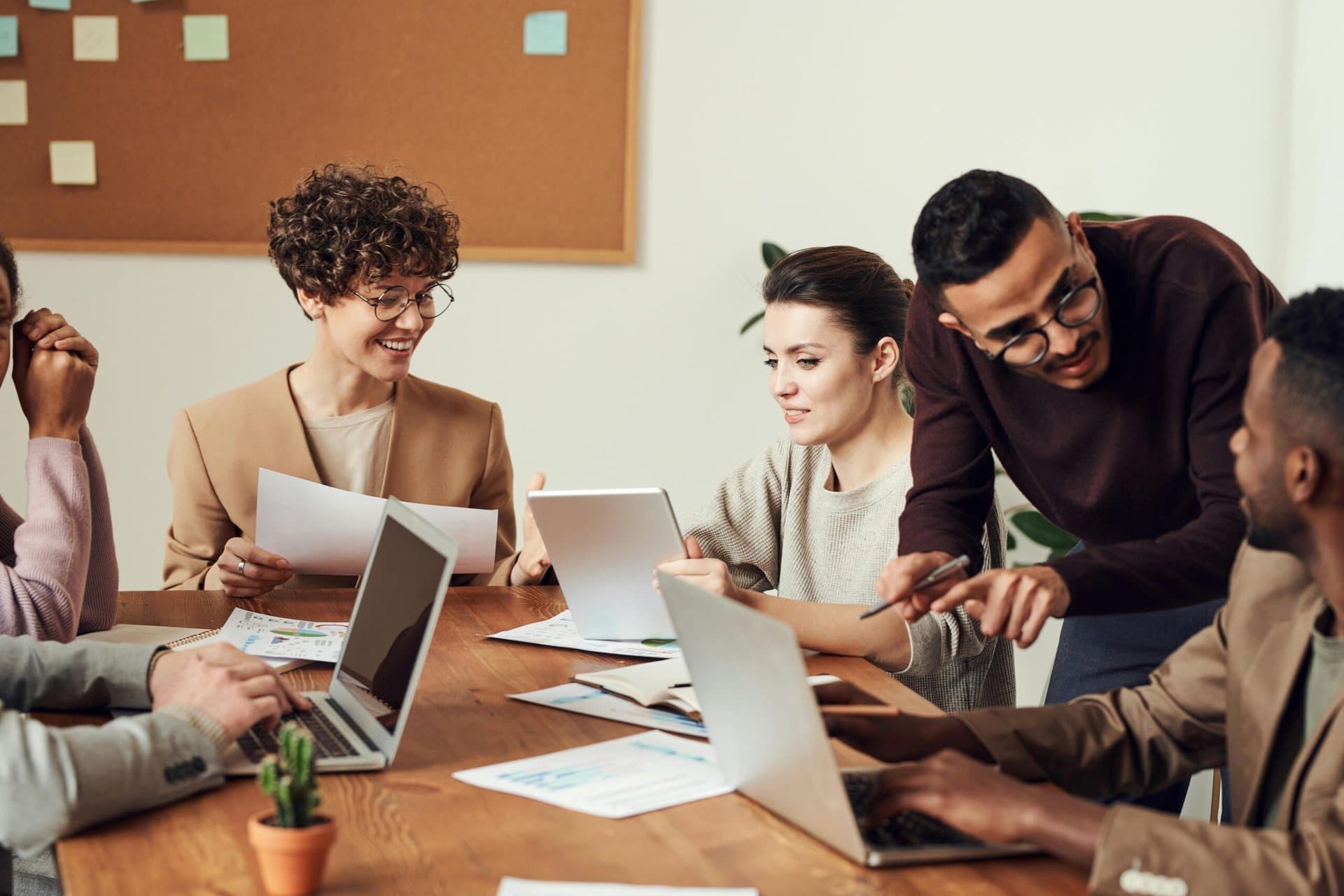 happy employees who are revieing health insurance